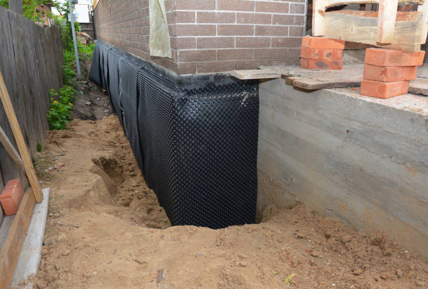 SJ Waterproofing Pros technician performing targeted Waterproofing assessment in Mount Gilead, NC